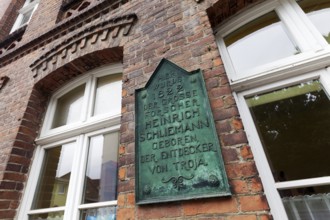 Plaque in the birthplace of Heinrich Schliemann, discoverer of Troy, Neubukow, district of Rostock,