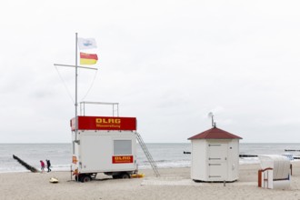 DLGR water rescue station on the beach at the Baltic Sea, grey sky, Kühlungsborn,