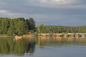 Canoe, boathouses, holiday homes, Leppinsee, Rechlin, Mecklenburg Lake District,