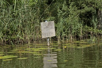 Old signpost at the border of the Müritz National Park, Leppinsee, Mecklenburg Lake District,