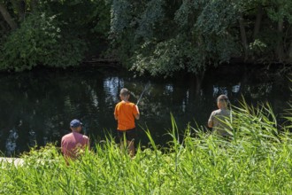 Father and sons fishing, Alte Fahrt canal, Bolter lock, Mecklenburg Lake District,