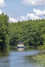 Houseboat, canal between Mirower See and Zotzensee, Mecklenburg Lake District,