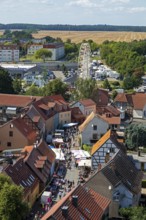 View from the tower of St Mary's Church, lake festival, Ferris wheel, old town centre, Röbel,