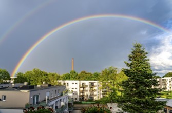Rainbow after a thunderstorm over a residential neighbourhood in Essen-Rüttenscheid, North