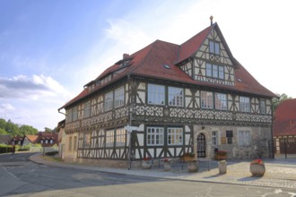 Historic official residence built in 1665, half-timbered house, hipped roof, Themar, fieldstone,