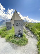In front sign for Pyramid Museum Musée Museo Museum Mont Cenis, behind it Pyramid Museum with