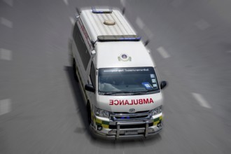 Ambulance with blue light, Bangkok, Thailand