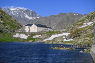 View from Italian side on small island in Lac du Grand Saint Bernard in the background on Swiss