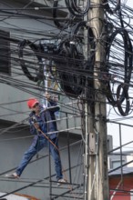 Craftsman welding metal rods, Bangkok, Thailand