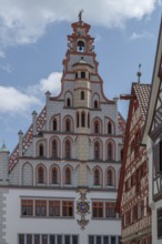 Historic gable of the town hall, built in 1426, historic half-timbered houses on the right, Bad