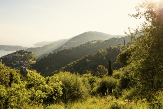 Picturesque mountain village above the sea, sunset, Èze, Cote d'Azur, Alpes-Maritimes,
