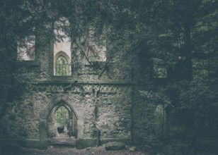 Ruins of a Gothic chapel in the forest near Greifenstein Castle, Heiligenstadt in Upper Franconia,
