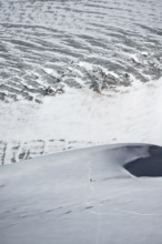 Mountaineer in the distance on the Übeltalferner glacier, Stubai Alps, South Tyrol, Italy