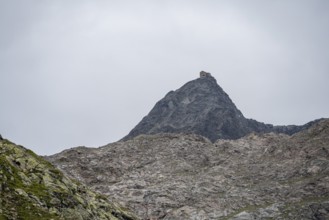 Becherhaus mountain hut on the rocky summit of the Becher, Stubai Alps, near Ridnaun, South Tyrol,
