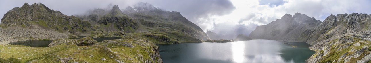 Mountain lakes Wangenitzsee and Kreuzsee, cloudy mountain peaks in the morning, Schober group, Hohe