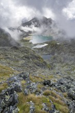Mountain lakes Wangenitzsee and Kreuzsee, cloudy mountain peaks in the morning, Schober group, Hohe