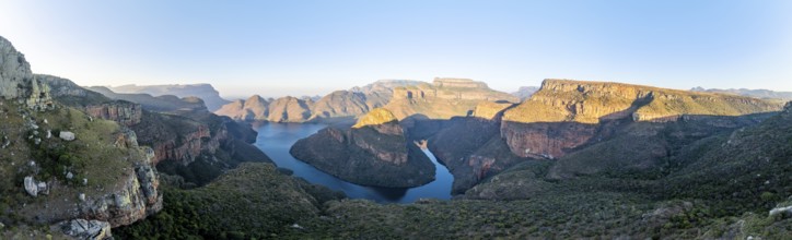 Panorama, sunset at Blyde River Canyon with Three Rondawels peak, view of canyon with Blyde River