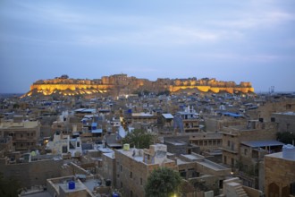City view Jaisalmer at blue hour, behind the fortress in the light, Jaisalmer, Rajasthan, India