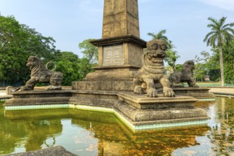 Independence Memorial Hall in Cinnamon Gardens, Lions on the Commemorative water basin in the honor