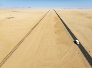 Rails and the B4 tarred road between Aus and Lüderitz in the southern Namib Desert. Aerial view.