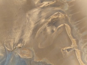 Low tide patterns in the ground of the Walvis Bay Lagoon. Aerial view. Drone shot. Namibia