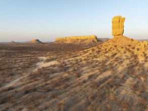 The Vingerklip (rock finger) and the Ugab Valley Terraces are surrounded by thornbush and mopane