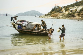 A family home living on a small sampan boat, Castle Peak, New Territories, Hong Kong, Asia, 1964