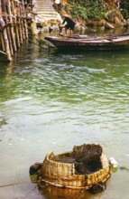 Woven basket with net used to keep fish fresh, Castle Peak, New Territories, Hong Kong, Asia, 1964