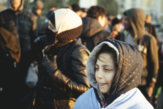 Refugees on the Inn bridge, Braunau am Inn, Austria, 2015