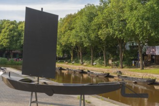 Historic peat harbour with peat barge, mooring, peat as heating material, transport from nearby