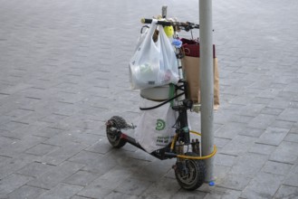 Electric scooter with bags, Abu Dhabi, United Arab Emirates