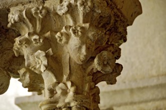 Slender Gothic column with filigree capital in the cloister, Gothic basilica of the Cistercian