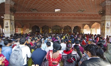 Devout Indians at the Govind Dev Ji Hindu temple in the old city centre, Jaipur, Rajasthan, India