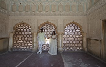 Indian bride and groom at Amber Fort or fortress, Jaipur, Rajasthan, India