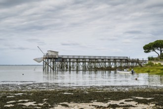 Fishing huts over Randonnee entre Histoire et Nature from a drone, Fouras, Fouras-les-Bains,