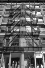 Six-storey residential building with fire escape, New York City, USA