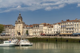 Harbour, Porte de la Grosse Horloge clock tower and the old town in La Rochelle, France