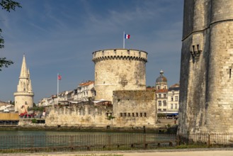 Harbour entrance to the old Vieux Port with the medieval towers Tour St.-Nicolas, Tour de la