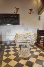 Baptismal font, sandstone baptismal font from the Renaissance period from 1603, created by H.