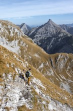 Mountain panorama with picturesque mountain landscape, mountaineers descending from the Gamsjoch,