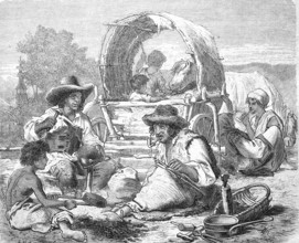 Travelling gypsies at work, here as metalworkers in front of their wagon, Hungary, Historical,