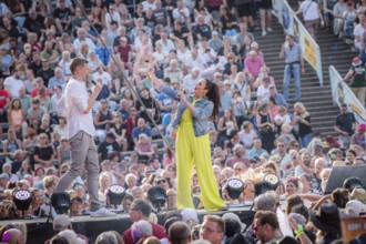 Sebastian Oswald and Simone Panteleit, presenters at the Berliner Rundfunk 91.4 Open Air at the