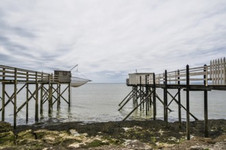 Fishing huts over Randonnee entre Histoire et Nature from a drone, Fouras, Fouras-les-Bains,