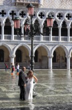 Piazzetta, wedding photos at the Acqua Alta flood, Venice Veneto, Italy