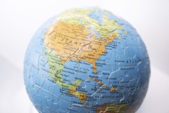 Puzzle globe. Map made from puzzle pieces. Gulf of Mexico