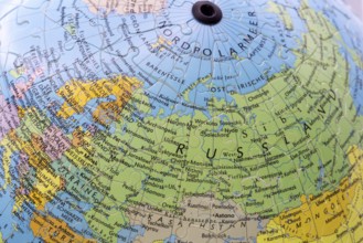 Puzzle globe. Map made from puzzle pieces. Russia and North Pole