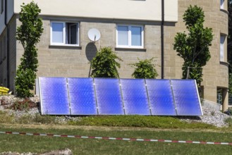 Solar collector in the garden of a detached house. Nagold, Baden-WÃ¼rttemberg, Germany