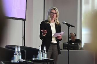 Dr Beatrice John from the consulting firm Adelphi speaks at a panel discussion organised by