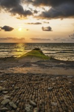 Sunset over beach of WHALE LIGHTHOUSE, Saint-Clement-des-Baleines, Atlantic, France