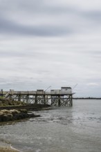Fishing huts over Randonnee entre Histoire et Nature from a drone, Fouras, Fouras-les-Bains,